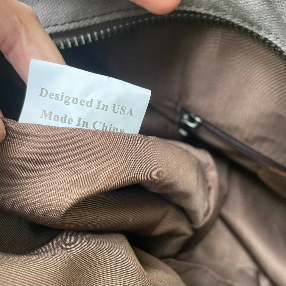 Grayish brown cotton/leather travel bag